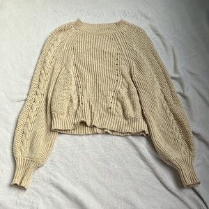 Women’s cable knit cream sweater